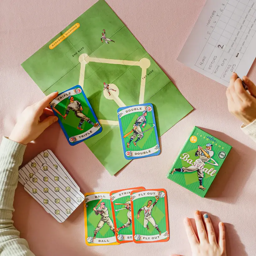 Hands holding Baseball playing cards