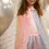 Thumbnail: Girl model wearing ombre pastel rainbow dress-up cape & matching skirt