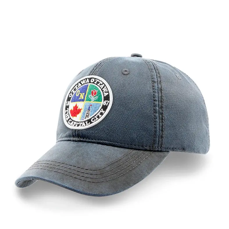 Right front view of denim blue baseball cap with embroidered Ottawa patch at front