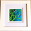 Thumbnail: White framed white matted square dragonfly print oil pastel in blues, greens & purple