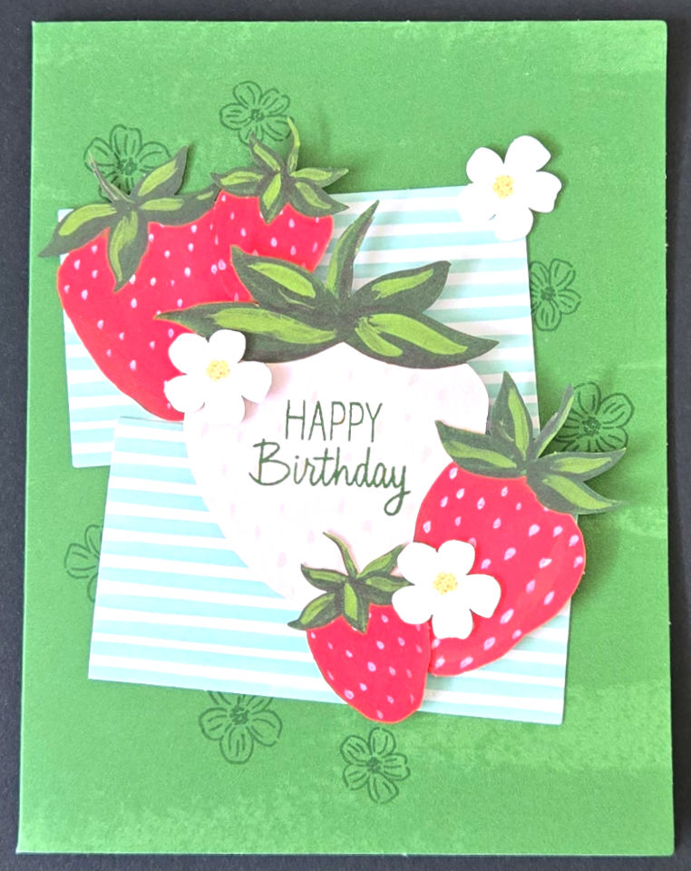 Handmade birthday card featuring layered paper strawberries, blossoms, and Happy Birthday text at Tickled Pink.