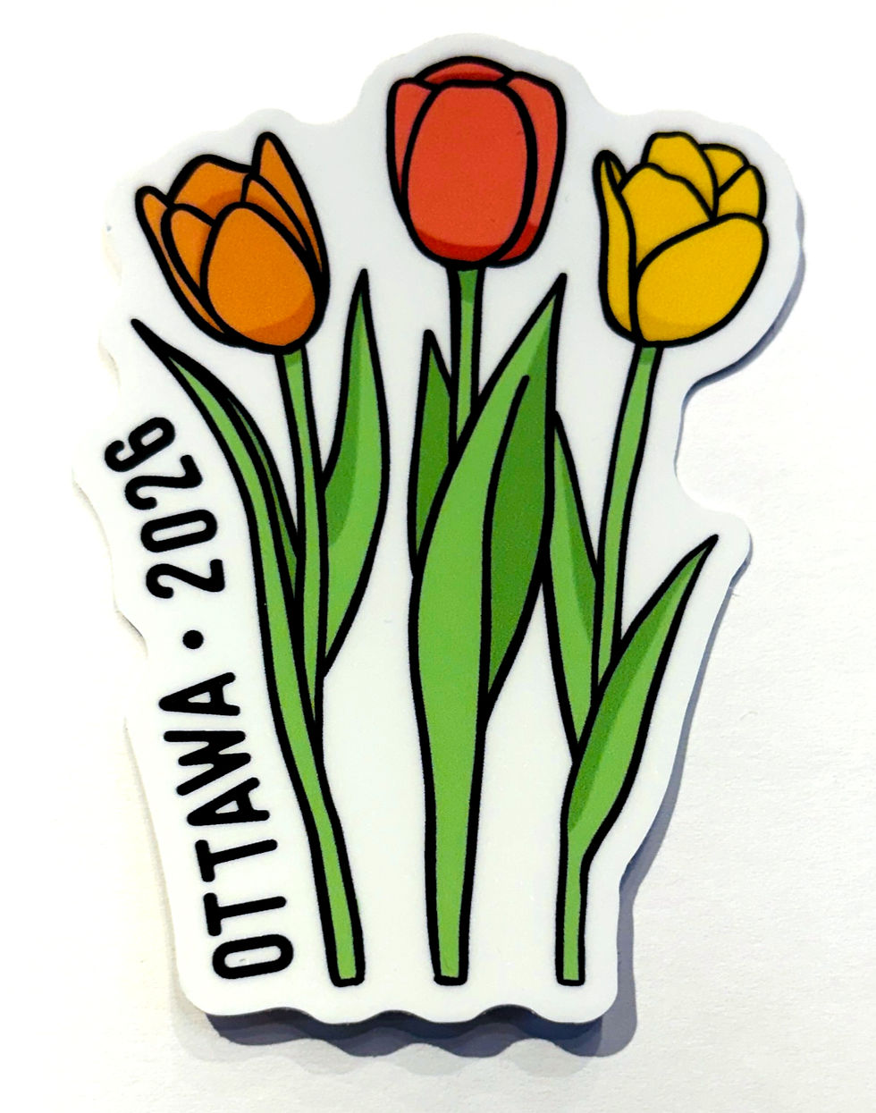 whit vinyl sticker in shape of 3 tulips with text, 'Ottawa 2026' on side