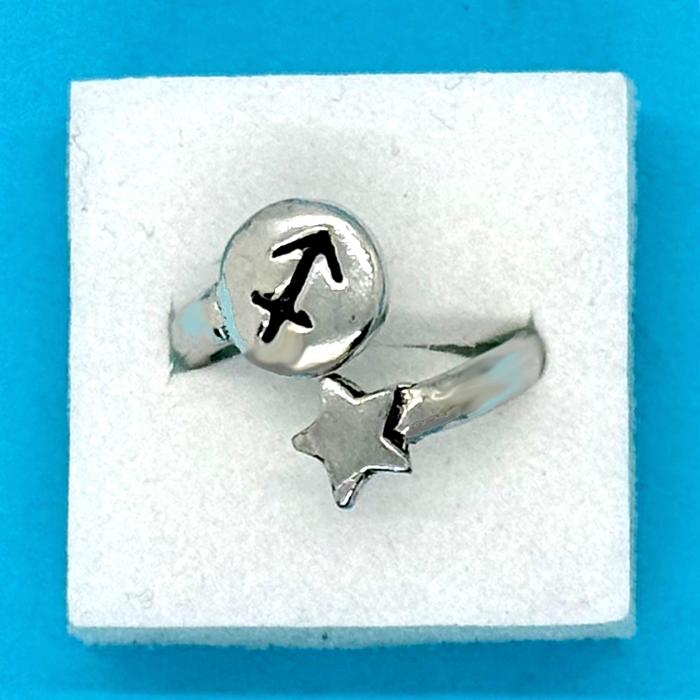 Thumbnail: Basic Spirit pewter zodiac wrap ring featuring a stamped Sagittarius symbol and a small star at Tickled Pink.