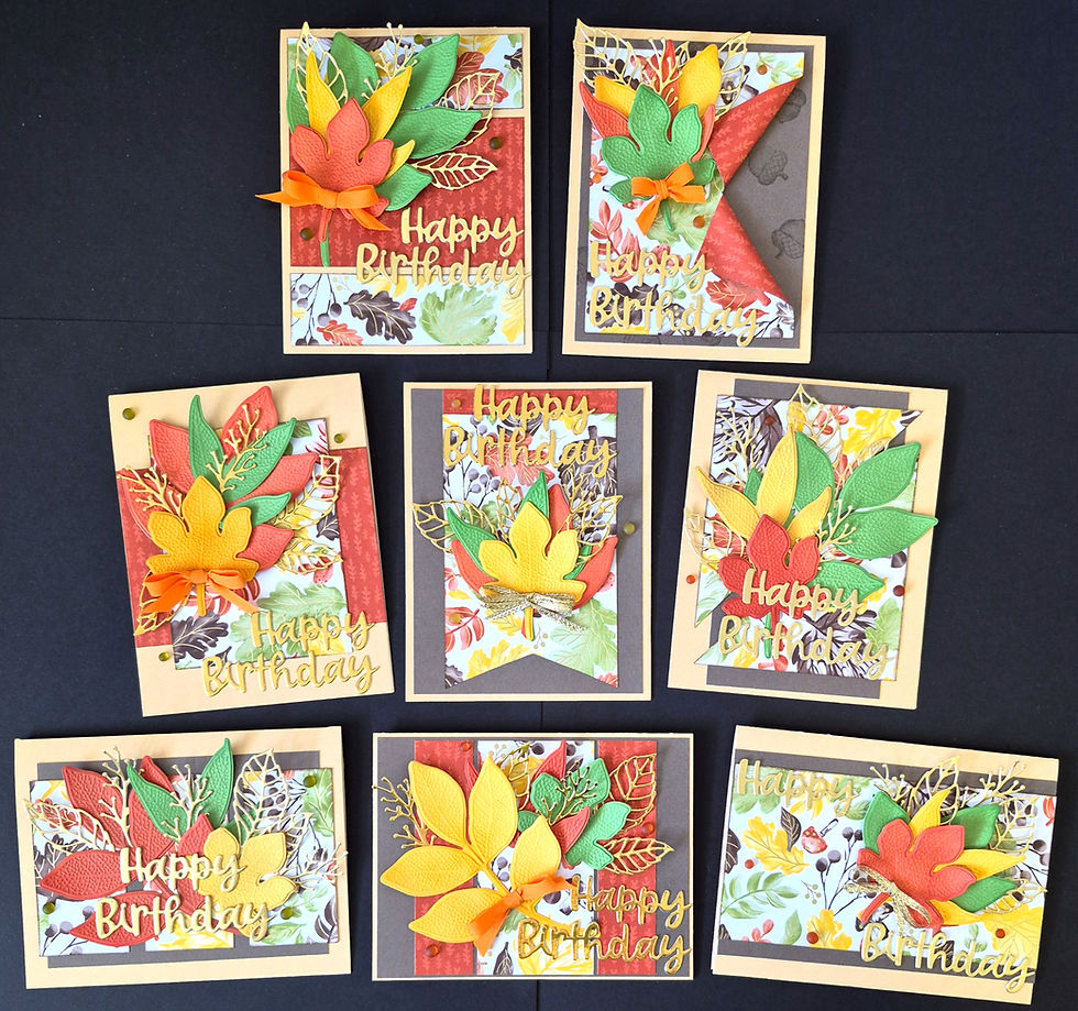A collection of eight handmade birthday cards featuring layered maple leaves and botanical designs at Tickled Pink.