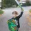 Thumbnail: Little boy brandishing Green & silver Dragon Sword & matching shield