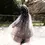 Thumbnail: Back view of child wearing long purple cape with gold stars & constellations embroidered on tulle over-layer