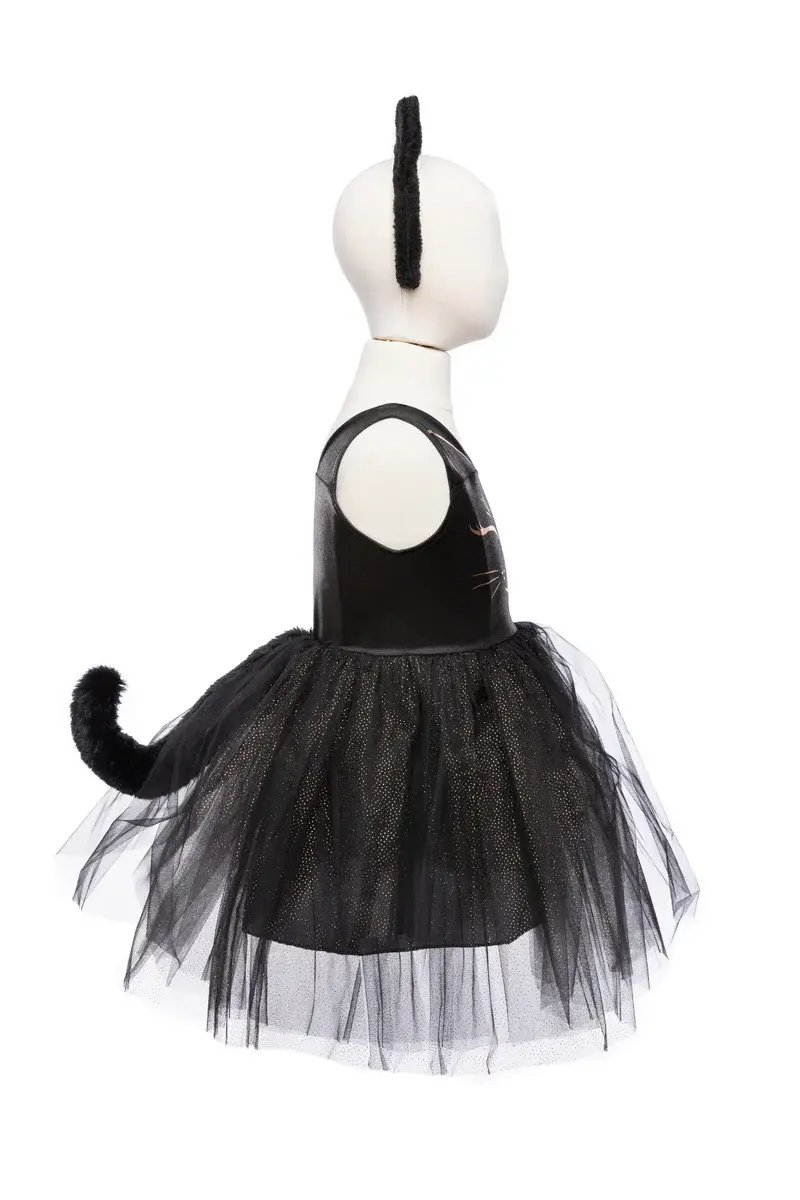 Side view of sparkly black short dress with black tail, & cat ears headband
