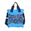 Thumbnail: Front view of large rectangular shoulder bag printed with artist Norval Morrisseau's painting, 'Flowers and Birds'