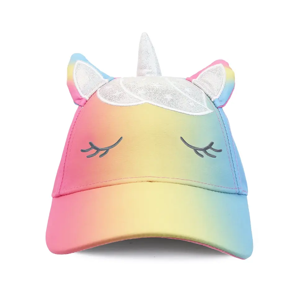 The front view of a FlapJackKids rainbow gradient unicorn ball cap with embroidered eyelashes at Tickled Pink.