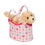 Thumbnail: Front right view of white bag with strawberries print & golden retriever stuffed toy inside
