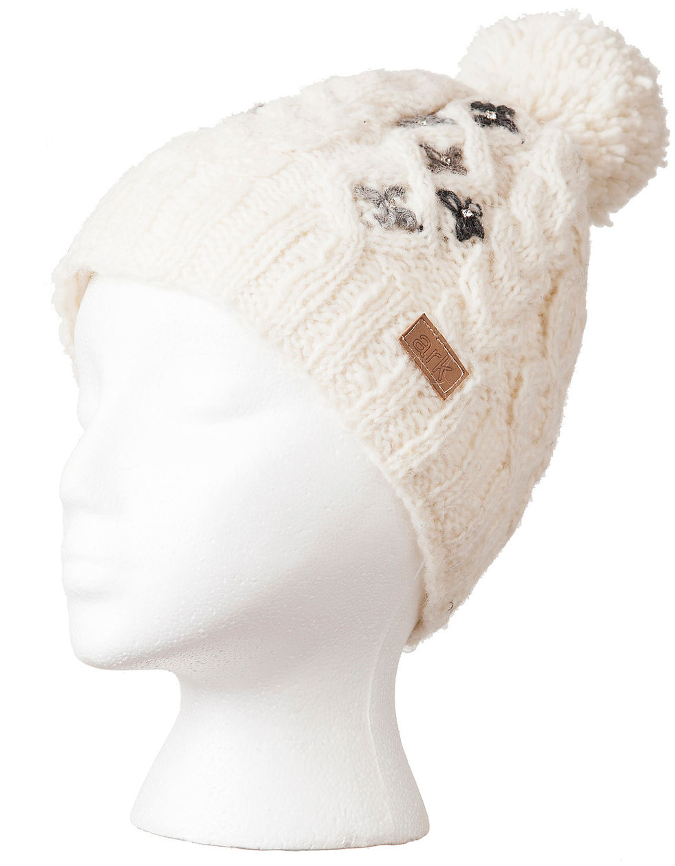 Thumbnail: Natural white cable knit wool hat with pompom-tiny 4-petal flowers on one side in gray