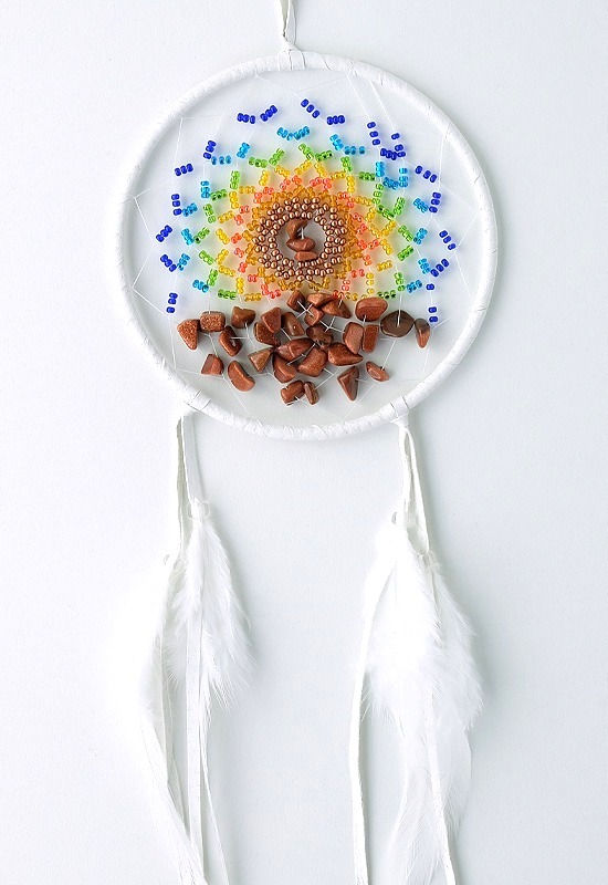 4" white leather dream catcher - multi-colored beads & red goldstone woven in web & white feathers hanging from bottom