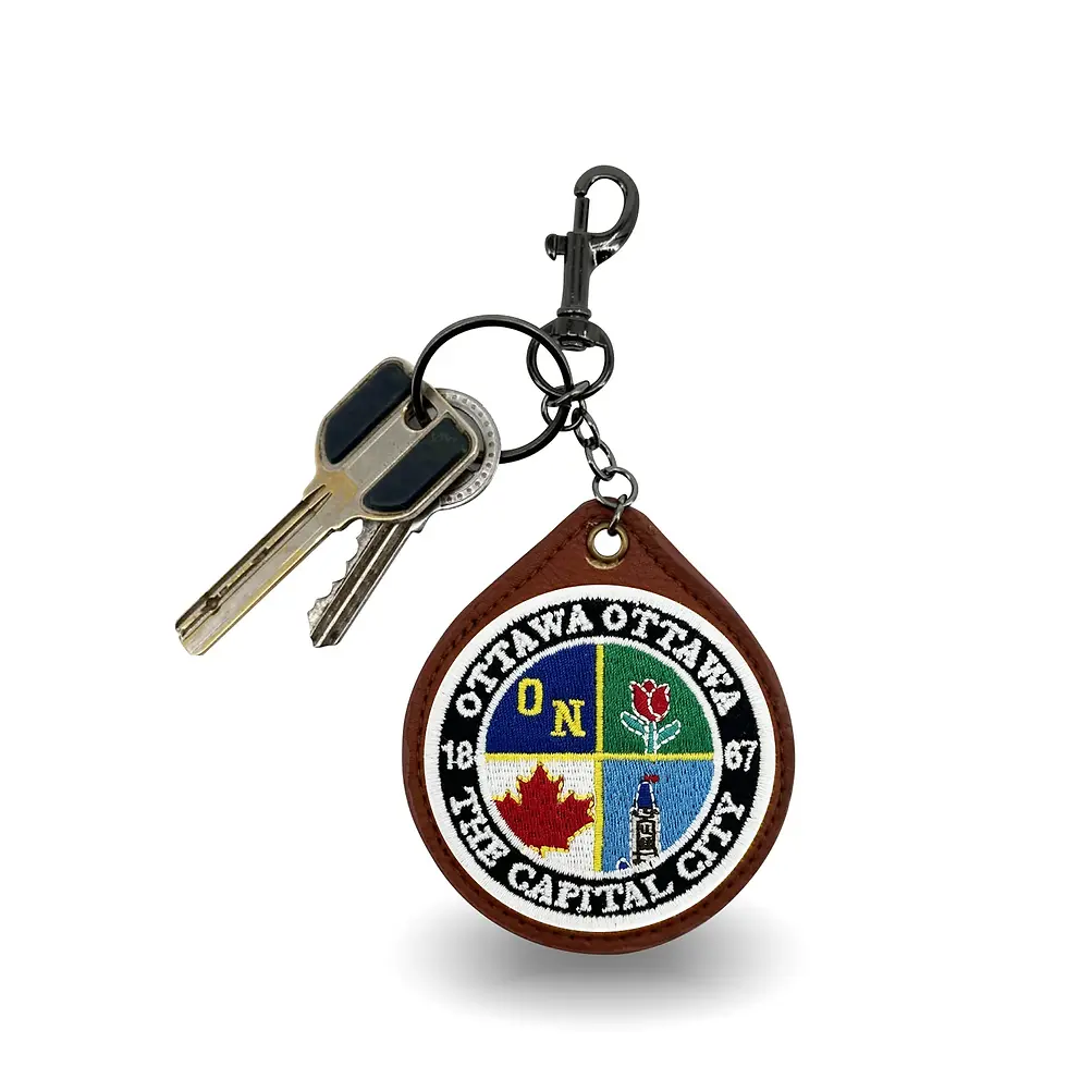 Front of embroidered Ottawa patch on leather fob with attached dog leash clip & key ring