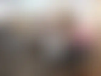 Three people sitting at a table at a senior home