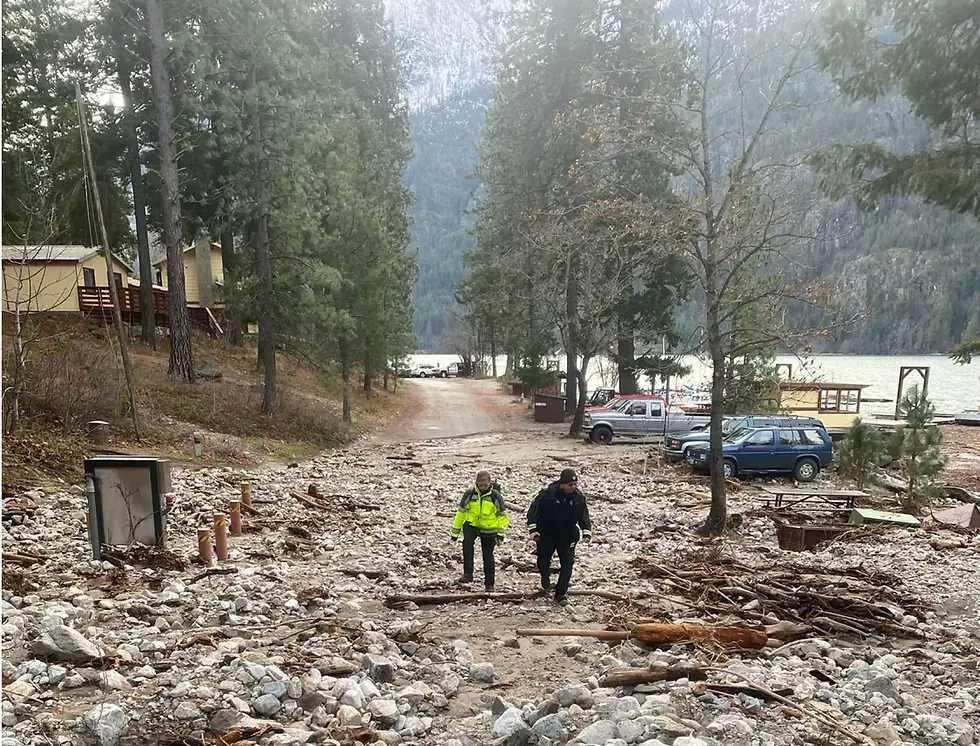 Nearly a year after wildfire scarred the landscape, flooding and landslides have damadged road and boat access in Stehekin, Wash., leaving some residents isolated along upper Lake Chelan. (Credit: Sgt. Jason Reinfeld/Chelan County Emergency Management)