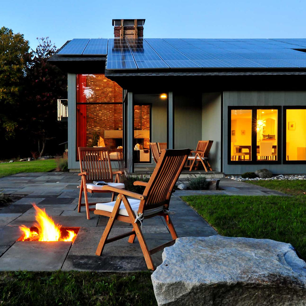 Exterior custom luxury home patio with built-in fire pit