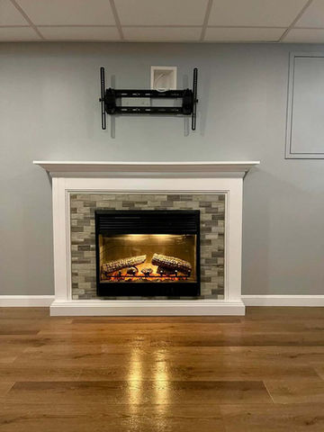 Television wall mount above gas fireplace