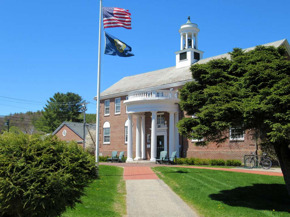 Large brick building with flagpole