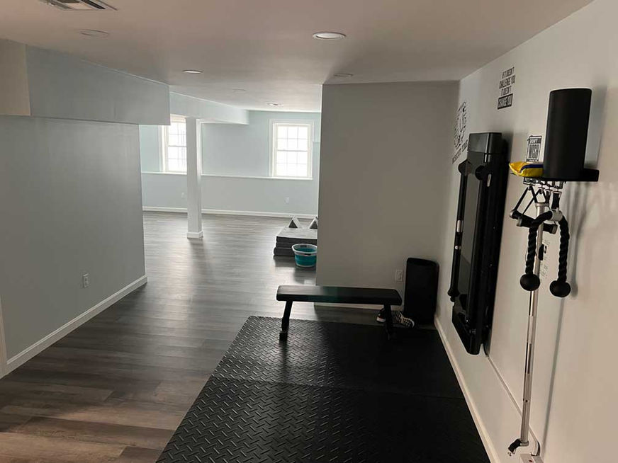 Finished basement with exercise area