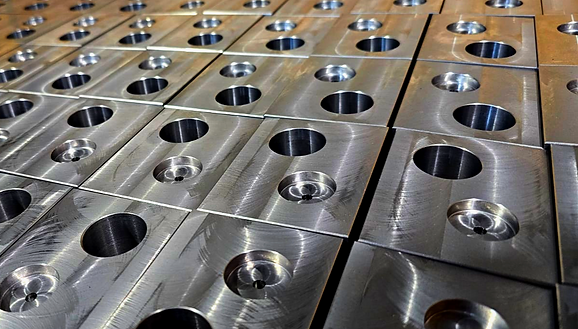 High volume machined parts for hydraulics industry.