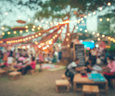Abstract blur people in night festival city park bokeh background - vintage tone.jpg