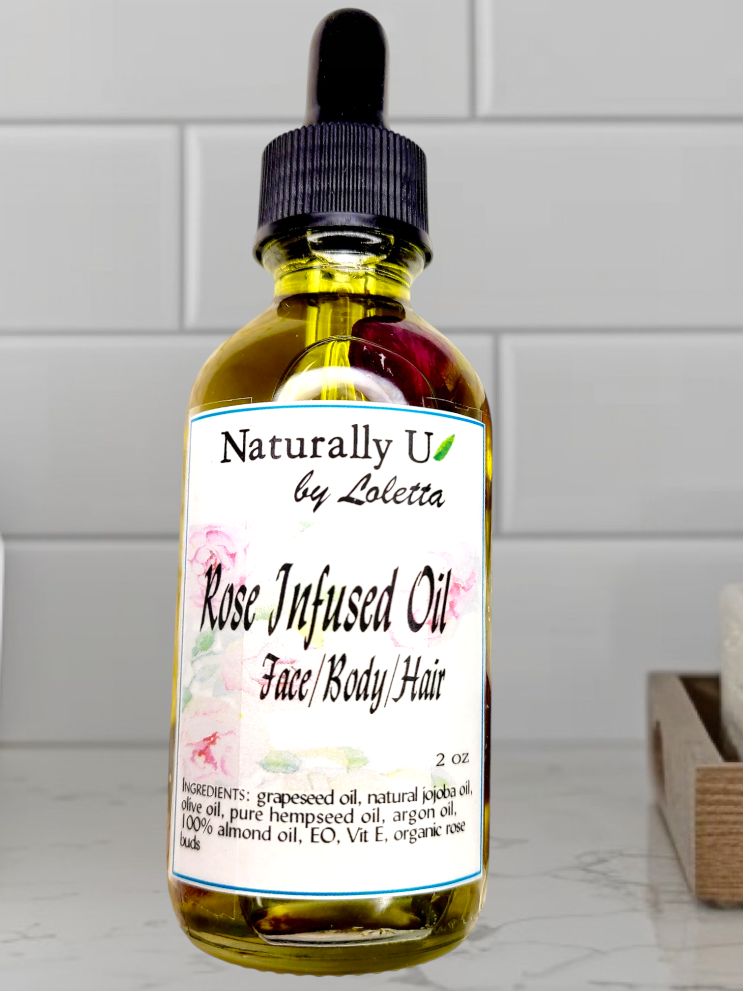 ROSE INFUSED OIL  $19. (2oz)