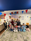 children posing in a photo booth set up for La Semaine de la Francophonie