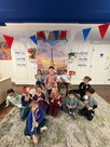 children posing in a photo booth set up for La Semaine de la Francophonie