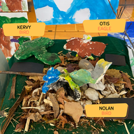 art display of animal sculptures created by children