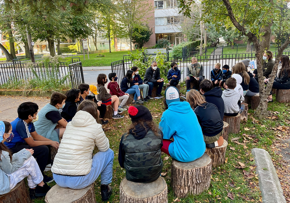 kids gathered outside in circle