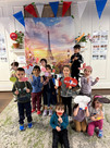 children posing in a photo booth set up for La Semaine de la Francophonie