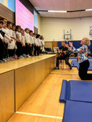 children singing on stage