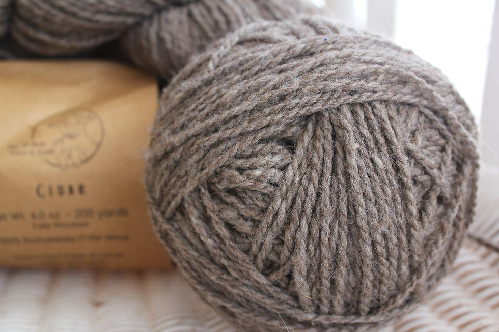 Ball of natural brown wool yarn