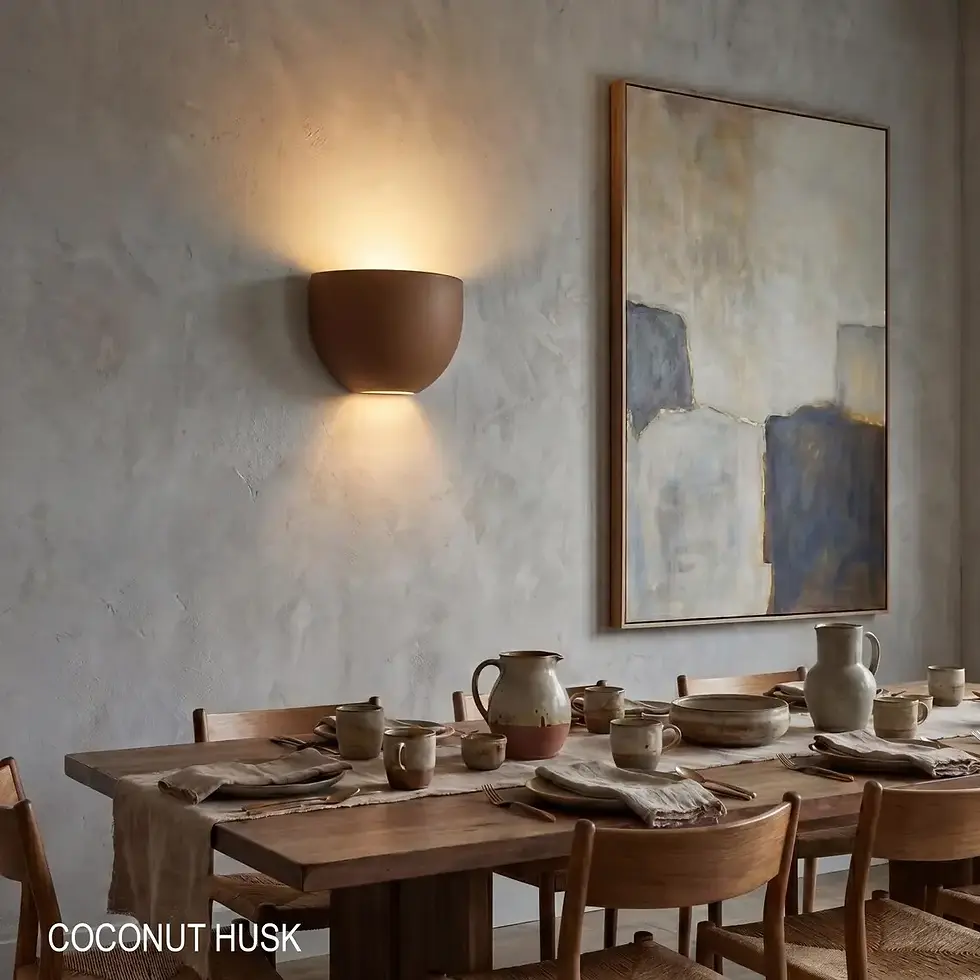 Thumbnail: A brown Worbic ceramic wall sconce illuminating a rustic dining space with a wooden table and textured walls.