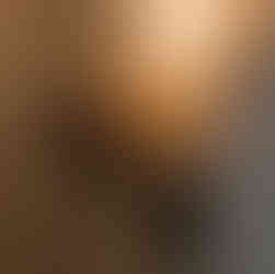 Naaya wall sconces with matte finish brass fittings in white and black creating warm and cosy amabiance.