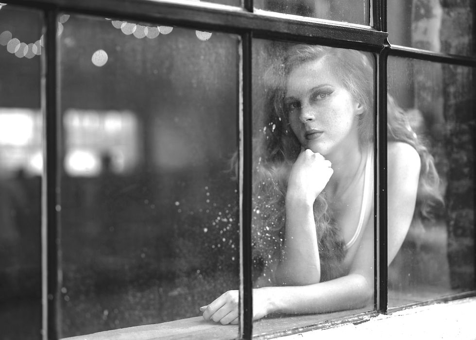 Woman remembering past lives and karmic residues.