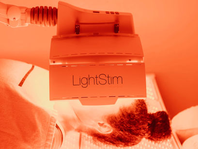 LightStim LED therapy bed at Buddha Bella Healing Center in Phoenix, a calming wellness space designed for red light therapy to support recovery, skin health, and overall relaxation.