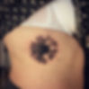 Daisy flower tattoo