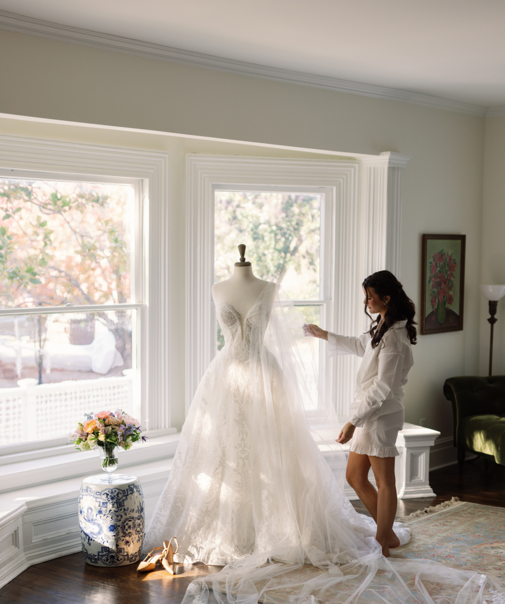 A Magnolia Manor 1843 bride savoring her getting ready bridal suite before her platinum wedding package