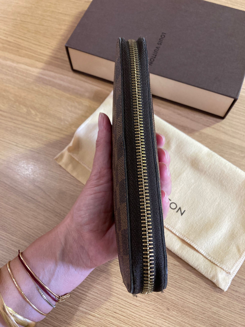 Thumbnail: Compagnon Vuitton modèle Zippy