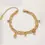 Thumbnail: Golden Charm Link Bracelet