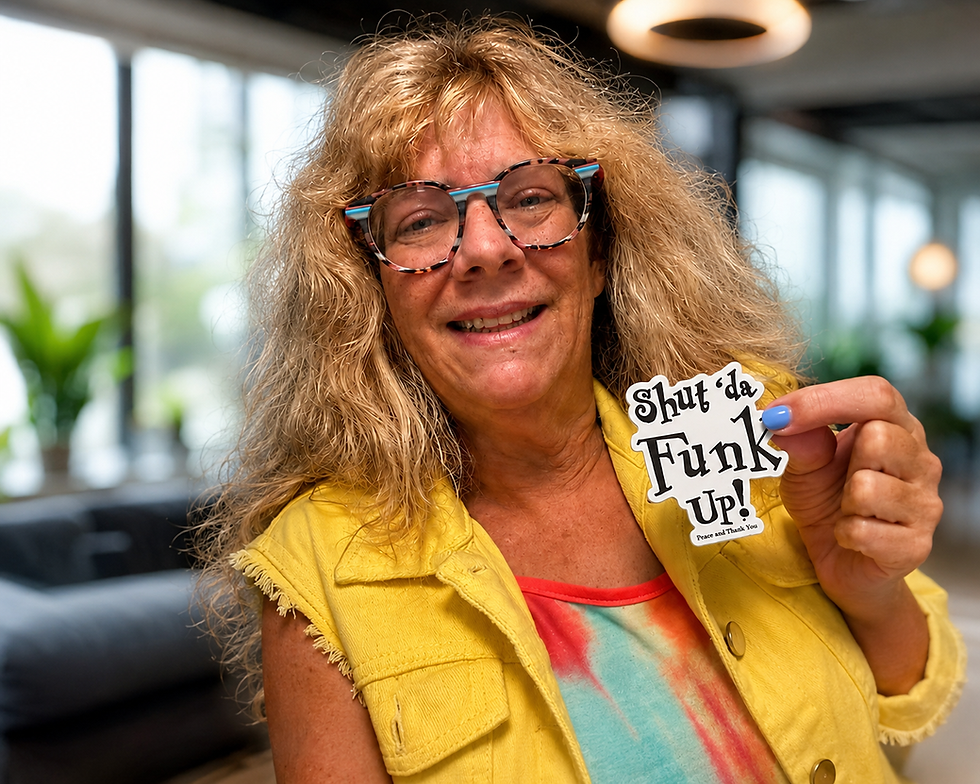 Nancy, Shut Da Funk Up founder, holding brand sticker