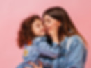young-mom-kissing-daughter