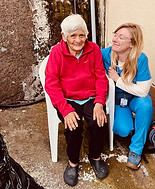 Tess MacQueen helping a patient in Ecuador