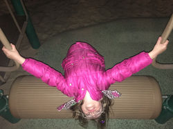 Rolling Backward on the Playground