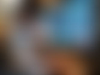 Close-up of an Australian consultant comparing ISO 42001 and ISO 27001 documents side by side on a desk, highlighting AI governance and information security standards.