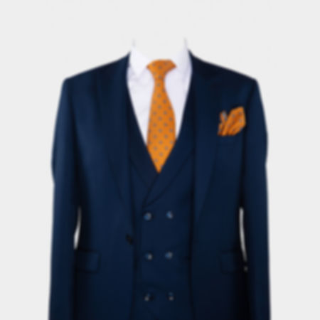 Orange Krawattenmuster und Einstecktuch