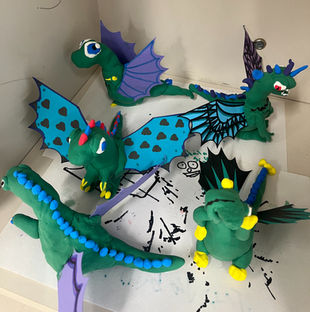 clay dragon sculptures by elementary students