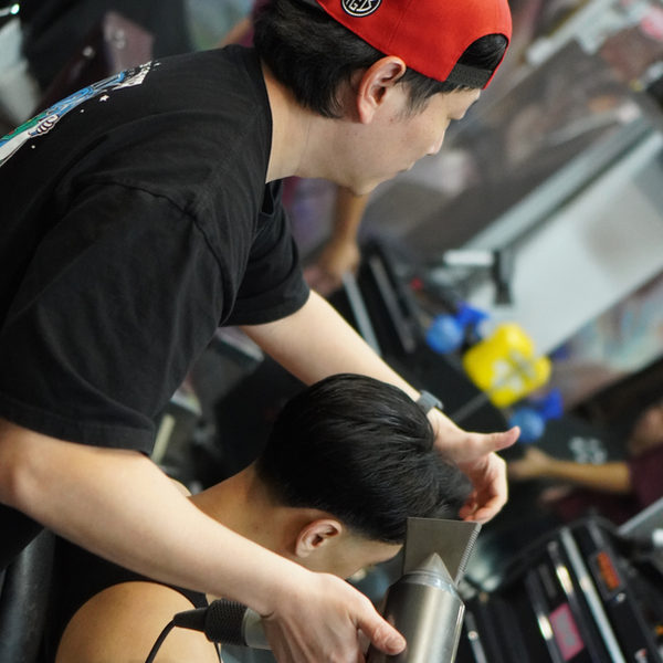 Barbers at work on the floor