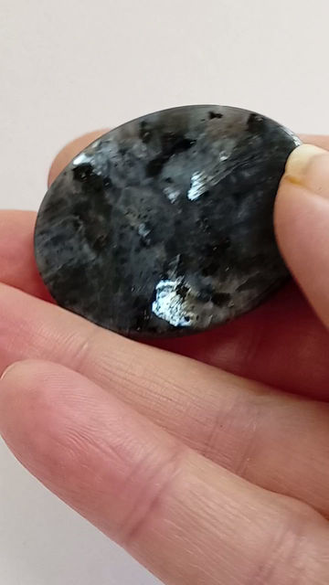 Thumbnail: a side on view of the labradorite tumbled stone